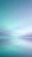 Soft blurred gradient background in turquoise and purple tones with dreamy atmospheric effect for modern design projects and presentations.