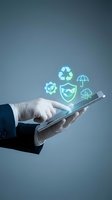 Businessman in white gloves holding tablet with glowing insurance and protection icons including recycling symbol, checkmark, shield, and umbrella for risk management and digital security concepts.