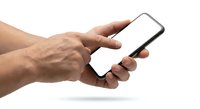 Male hands holding smartphone with blank white screen isolated on white background for mobile app mockup and digital technology concepts.