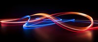 Glowing red and blue light trails forming dynamic curves and waves against dark background, creating abstract luminous streaks and motion effects.