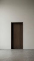 Empty dark wooden doorway in minimalist interior space with white walls and concrete floor, suitable for architectural visualization, interior design concepts, and modern home decor projects.