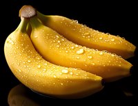 Fresh ripe yellow bananas with water droplets on black background, showcasing natural texture and vibrant color for food photography.