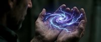 Man holding glowing purple energy vortex in cupped hands, magical swirling light effect, mystical power concept for fantasy, science fiction, and supernatural design projects.