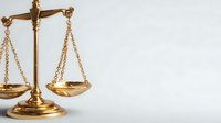 Golden scales of justice on white background, symbolizing law, fairness, and legal system for attorney services, courtroom concepts, and judicial proceedings.