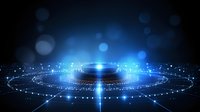 Glowing blue circular portal with light rays and particles on dark background creates futuristic sci-fi atmosphere for technology presentations.