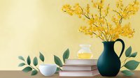 Yellow orchids in dark green ceramic vase with books, glass carafe and white bowl on table against beige wall, minimalist spring home decor composition.