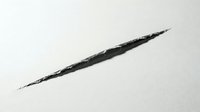 Isolated black charcoal stroke on white background, perfect for graphic design, web elements, and creative projects requiring minimalist artistic marks.