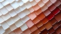 Abstract geometric pattern with gradient color squares transitioning from white to warm orange and red tones creating dimensional textured surface.