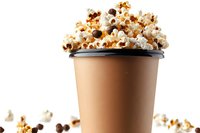 Fresh popcorn overflowing from brown paper cup on white background, scattered kernels around base, isolated food photography for cinema and snack concepts.