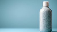 White speckled bottle on turquoise background with soft shadow and copy space, minimalist composition for cosmetic, wellness or healthcare product presentation.