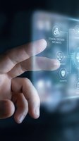 Hand touching holographic interface displaying ethical decision pathways with transparency and fairness icons for business technology applications.