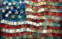 American flag mosaic pattern with red, white and blue stained glass pieces creating a dynamic, wavy design featuring stars and stripes in an artistic interpretation.