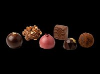 Assorted chocolate candies and truffles isolated on transparent background, ready for confectionery design, packaging, print-on-demand products, and culinary graphics.