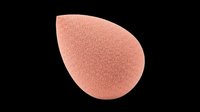 Peach-toned makeup sponge with teardrop shape, isolated on transparent background. Ready for beauty product design, tutorials, packaging, and print-on-demand applications.