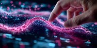 Magical glowing pink and blue particles flow in wave formation with human hand touching ethereal light stream against dark background, creating mystical atmosphere.
