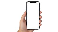 Hand holding modern smartphone with blank white screen isolated on white background for mockup and app presentation purposes.