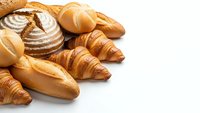Fresh baked bread and croissants assortment on white background. Bakery products collection for breakfast menu design and food advertising.