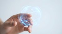 Hand holding glowing blue energy sphere with electric lightning effects against white background for futuristic technology concepts.