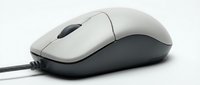 Wired computer mouse with gray and black body, side view on white background, isolated for design use.