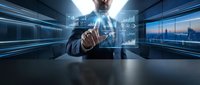 Businessman in suit pointing at digital holographic interface with financial data and city skyline, representing technology, innovation, and business analytics for corporate solutions.