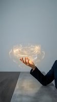 Businessman hand presenting glowing digital holographic interface with futuristic technology elements and data visualization for modern business solutions.