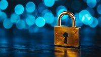 Golden padlock on dark reflective surface with blurred blue bokeh lights in background, symbolizing digital security and data protection.
