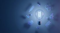 Glowing lightbulb surrounded by floating medical icons including stethoscope, pills, syringe on blue gradient background representing healthcare innovation.