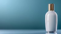 White cosmetic bottle with gold cap on turquoise background. Minimalist product photography for beauty and skincare marketing, isolated with copy space.