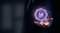 Businessman in dark suit holding glowing purple digital padlock hologram, symbolizing cybersecurity, data protection, and privacy technology.