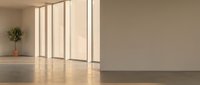 Empty modern interior room with large windows casting natural sunlight on polished concrete floor and beige walls for architectural design projects.