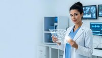Female doctor examining brain scan in modern medical office with diagnostic equipment and monitors displaying neurological data for healthcare analysis.