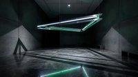 Futuristic concrete interior with glowing green neon triangle light installation suspended from ceiling creating modern architectural ambiance.