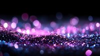 Magical glowing pink and blue bokeh lights with sparkly glitter particles on dark background, creating dreamy atmospheric effect for festive designs.
