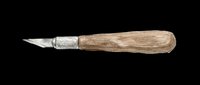 Vintage wood-handled palette knife with metal blade, isolated on transparent background. Ready for design use on t-shirts, clipart, stickers, print-on-demand products, and sublimation projects.