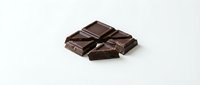 Dark chocolate pieces isolated on white background, ready for food and beverage design, packaging, and culinary content use.