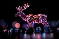 Glowing crystal moose decoration with pink and purple lights against dark background with bokeh effect creates magical holiday atmosphere.