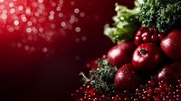 Fresh red cranberries and currants with green kale leaves on dark background with bokeh lights, macro food photography for winter holiday season.