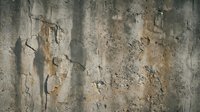 Weathered concrete wall with peeling paint and cracks showing aged urban decay texture for industrial backgrounds and grunge design projects.