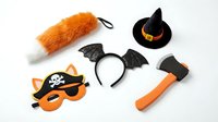 Halloween costume accessories collection with pirate mask, witch hat, bat headband, fox tail and toy axe isolated on white background for party supplies.