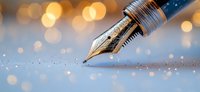 Golden fountain pen nib on glittering background with bokeh lights creates magical writing atmosphere for storytelling, creativity and literary inspiration.