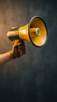 Gloved hand holding a vintage yellow megaphone against dark grunge background, symbolizing announcement, protest, or leadership.