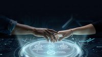 Two people joining hands over glowing digital interface with circuit patterns and holographic symbols, representing teamwork, partnership, and technology collaboration for business solutions.