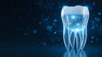 Futuristic digital tooth with glowing blue light effects and particles on dark background for dental technology and healthcare innovation concepts.