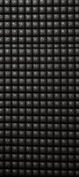 Dark cracked leather texture in grid pattern, seamless background for luxury upholstery or fashion design applications.