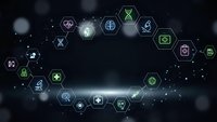 Medical technology network with hexagonal icons displaying healthcare symbols on dark background with glowing particles and bokeh effects.