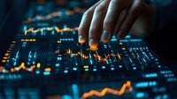 Financial trader analyzing digital stock market data and touching glowing charts on dark blue interactive display showing market trends and analytics.