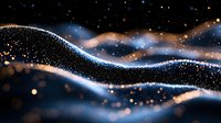 Glowing waves of sparkling particles flow against dark background creating magical abstract pattern with blue and gold light effects and bokeh.