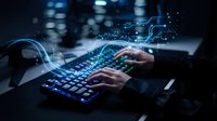 Hands typing on illuminated keyboard with digital data streams and glowing network connections in dark tech environment for cybersecurity concepts.