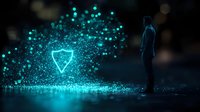 Glowing shield symbol with floating particles in dark space, silhouette of person standing nearby. Cybersecurity and digital protection concept for business presentations.