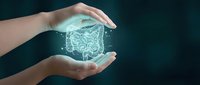 Protective hands surrounding glowing digital brain with neural network connections representing mental health care, artificial intelligence and cognitive protection.